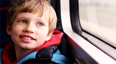 happy autistic child in the car