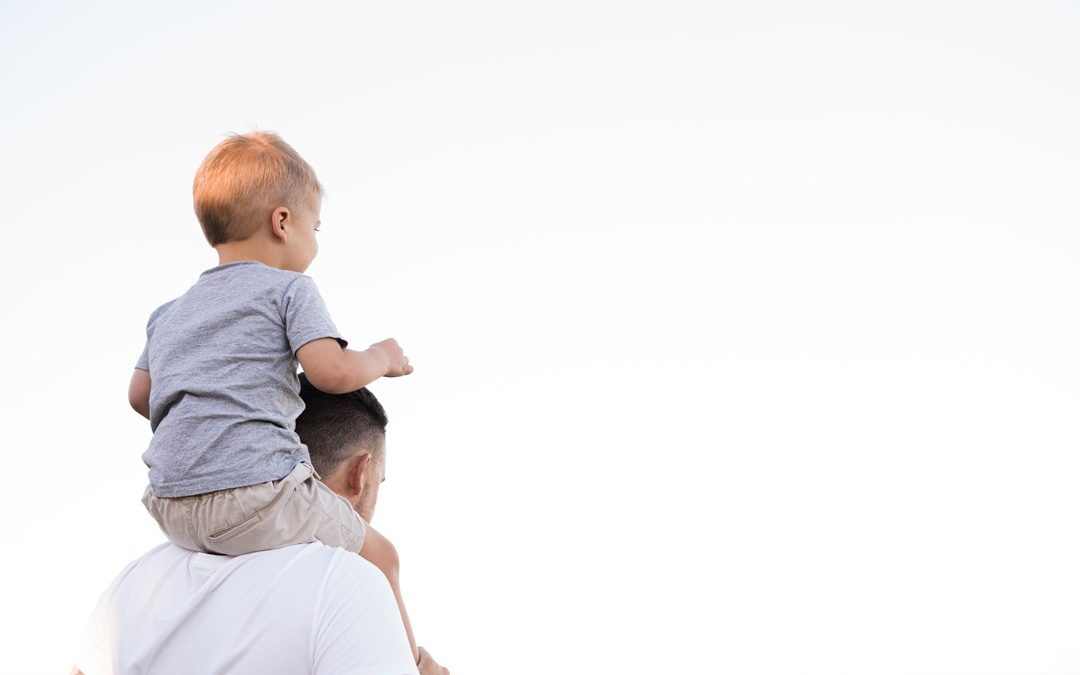 dad-carrying-his-son-by-kelli-mcclintock-unsplash