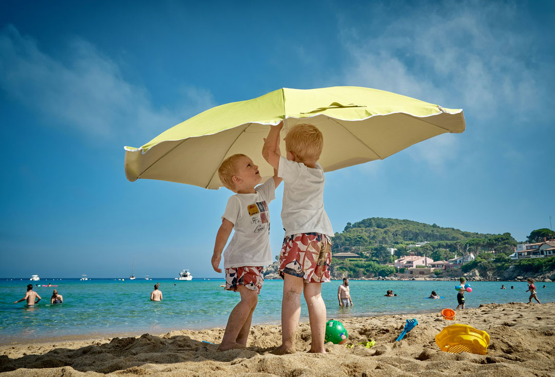 kids-summer-umbrella-vidar-nordli-mathisen-unsplash