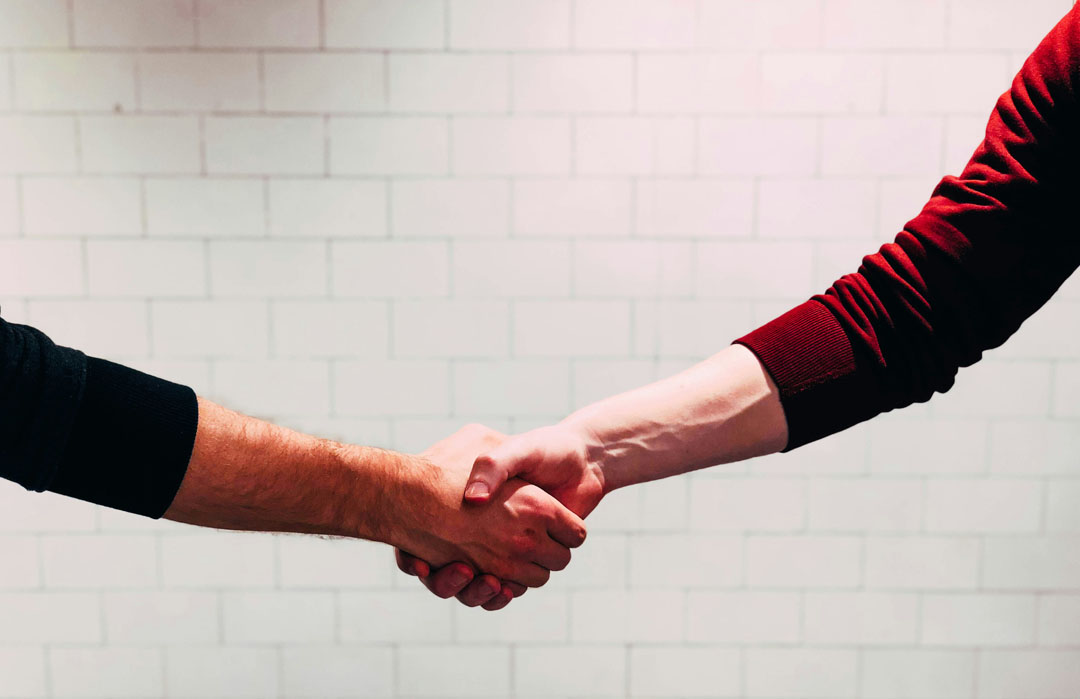 shaking-hands-chris-liverani-unsplash